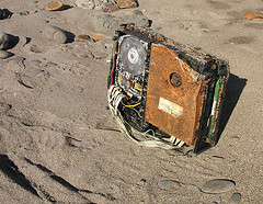 Dead Computer by Beatrice Murch (http://www.flickr.com/photos/82439748@N00/90055001/in/photolist-8Xydr-aQGMd-bs36J-eAK2Z-eAK41-mc5SD-migkk-n1B5S-qynNH-wN3vu-Bysm1-DCMmK-DCMrW-2Tz4Z9-3fSK17-3fSK9G-3fSLsd-3gZvZE-3mDkS3-4hkdWC-4jzpAn-4vYmpx-4DV365-4HfejV-4HYNgX-4TCaUv-5cwAAc-5dopRY-5koNU3-5ruA5X-5whRwW-5CUnhU-64ZG7b-6c1hTZ-6cbfj2-6kKvtz-6kVHbL-6tCvpF-6u39i3-6CLy4Q-6Y2TnM-6YaWwk-7gfUZm-7gAj7B-7gAjz6-7gAkev-7rU1du-7utPxM-a8pM1R-a1wi8V-9ZFVy7) used under Creative Commons Attribution 2.0 Generic.